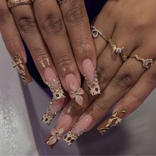 Charm Bloom floral press-on nails - almond shape, front view