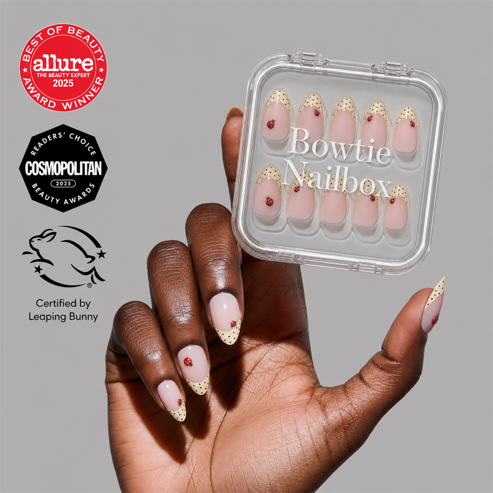 Lady Luck press-on nails on hand - lifestyle photo, polka dot finish