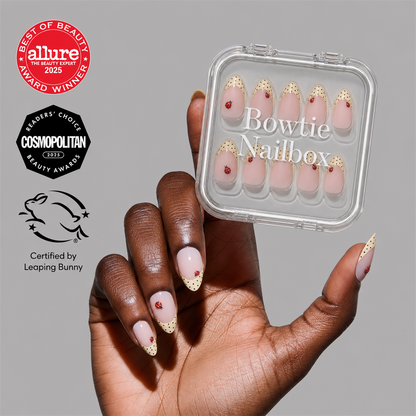 Lady Luck press-on nails on hand - lifestyle photo, polka dot finish