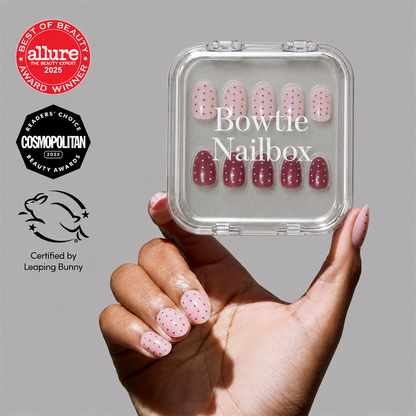 Cute As Cherry Pie press-on nails on hand - lifestyle photo, polka dot finish