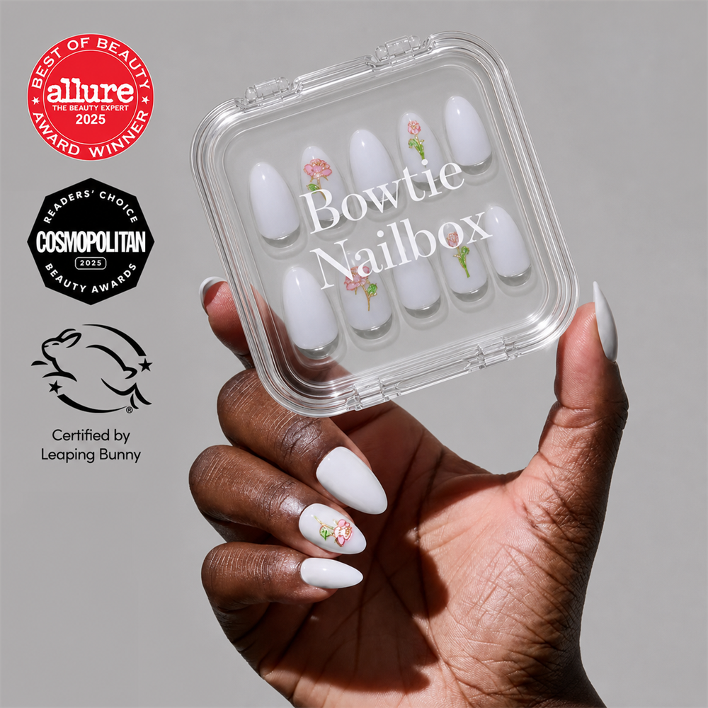 Floral Glow press-on nails on hand - lifestyle photo, milky cloud dancer finish