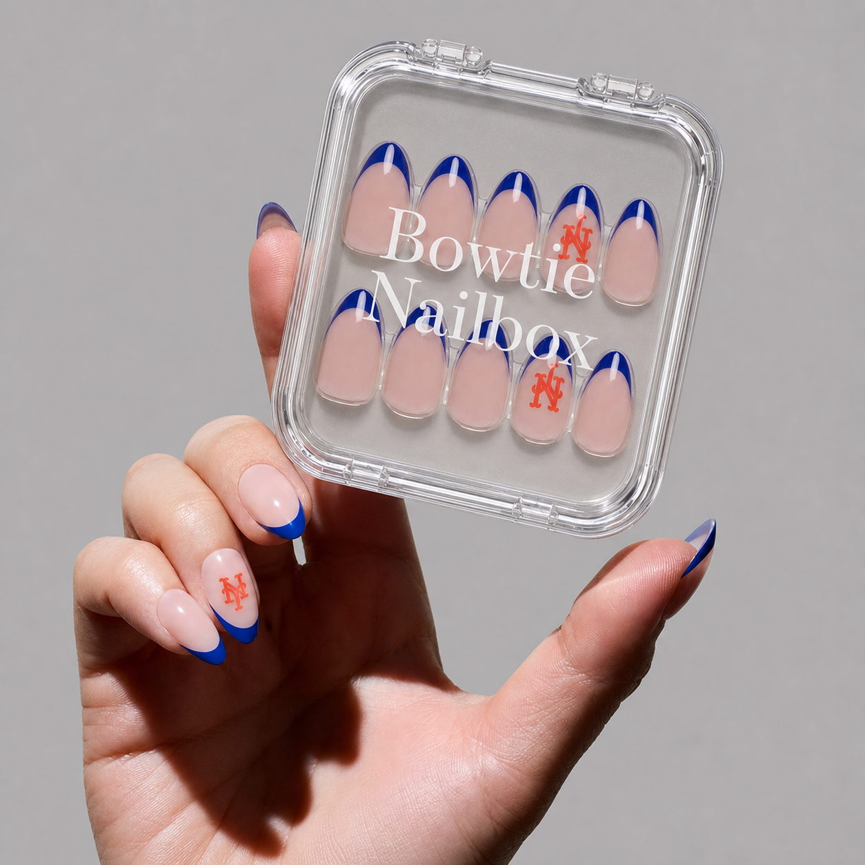 Ruby Ribbons press-on nails on hand - lifestyle photo, milky cloud dancer finish