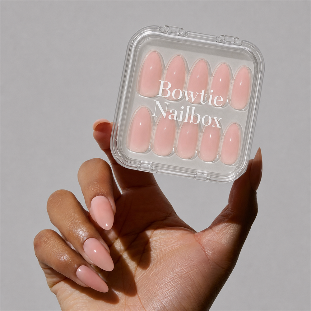 Sheer Pink press-on nails on hand - lifestyle photo, jelly glaze finish