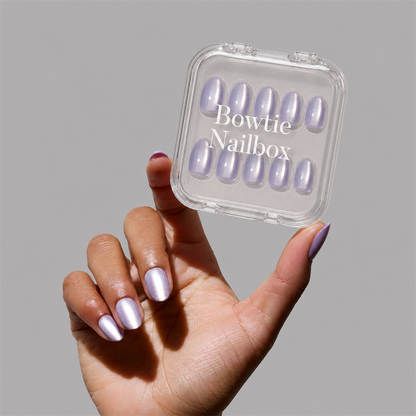 Mermaid's Tail press-on nails on hand - lifestyle photo, cat-eye velvet finish