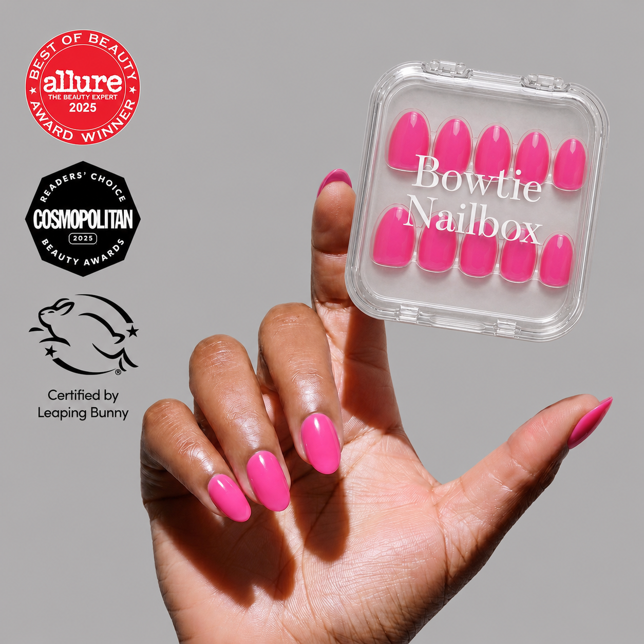 Hot Pink press-on nails on hand - lifestyle photo, summer finish