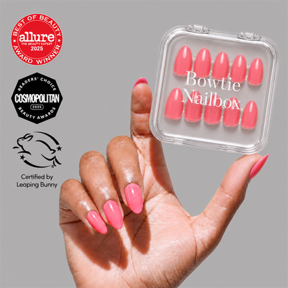 Flamingo Pink press-on nails on hand - lifestyle photo, summer finish