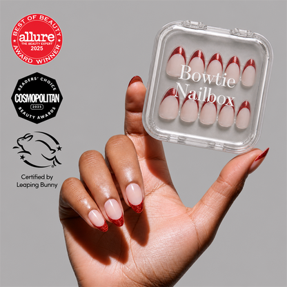 Red Affair press-on nails on hand - lifestyle photo, french tip finish
