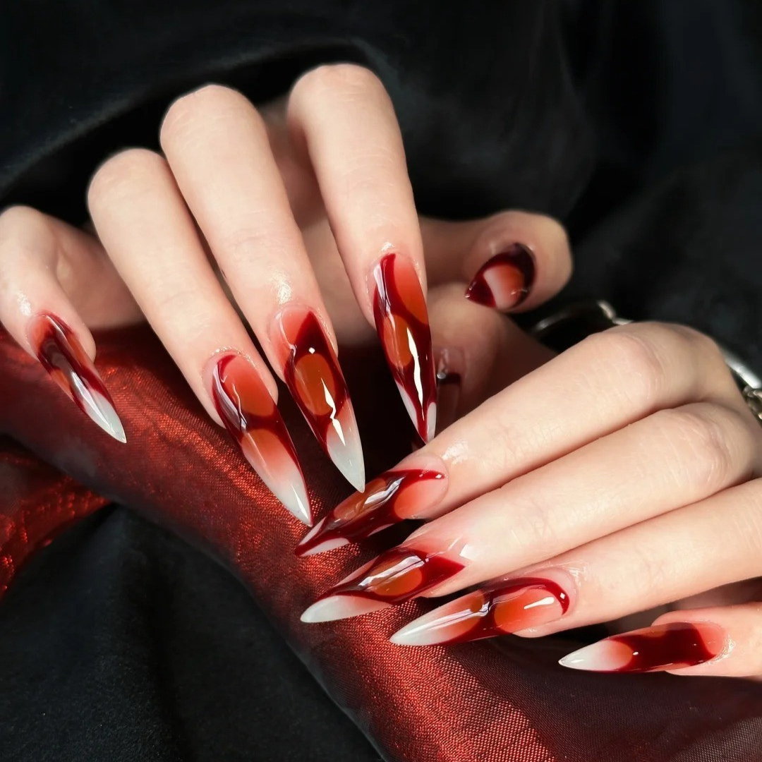 Crimson Veil seasonal press-on nails - almond shape, front view