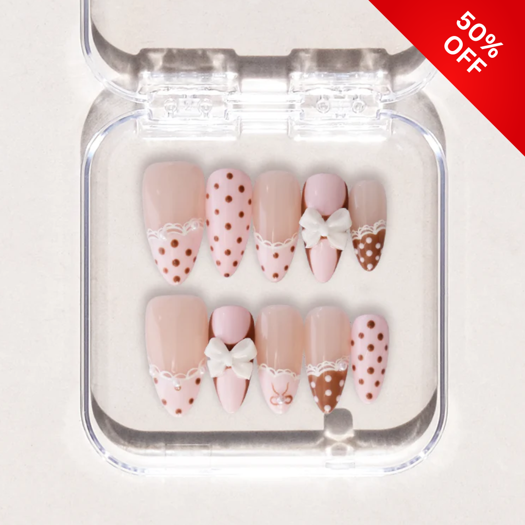 Soft Romance polka dot press-on nails - almond shape, front view