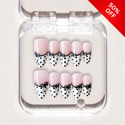 Soft Romance press-on nails on hand - lifestyle photo, polka dot finish