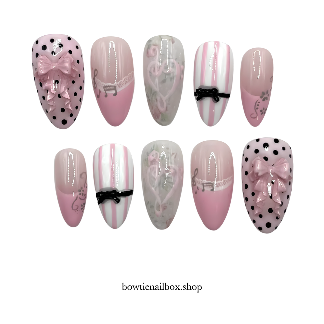 COQUETTE MELODY polka dot press-on nails - almond shape, front view
