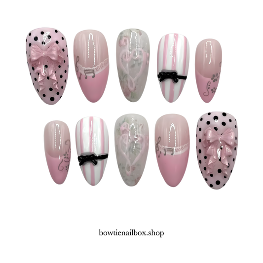 COQUETTE MELODY polka dot press-on nails - almond shape, front view