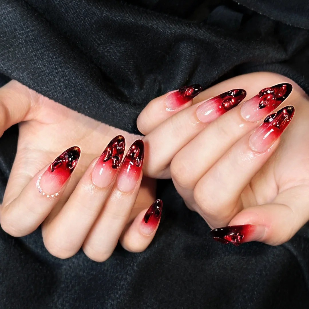 Grim Blossom floral press-on nails - almond shape, front view