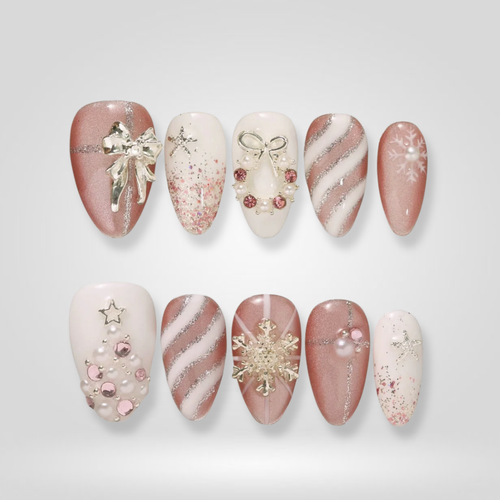 Pink Noel seasonal press-on nails - almond shape, front view