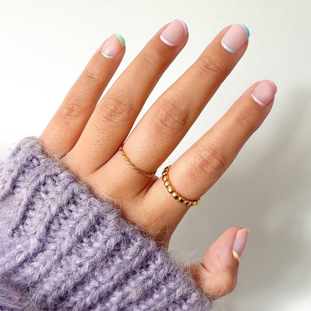 Tutti Frutti french tip press-on nails - round shape, front view