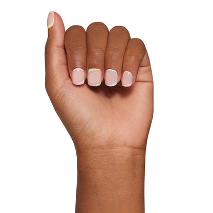 Tutti Frutti press-on nails on hand - lifestyle photo, french tip finish