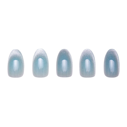 Unicorn Tears press-on nails on hand - lifestyle photo, cat-eye velvet finish