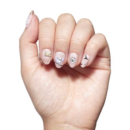 Hogwarts™ press-on nails on hand - lifestyle photo, soft neutral finish