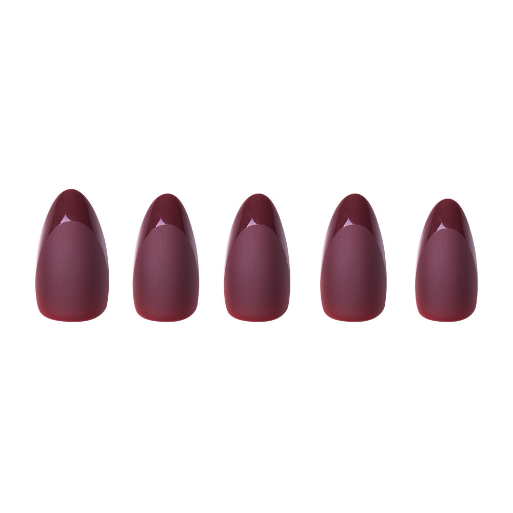 Merlot press-on nails close-up texture detail - french tip finish, US shipping