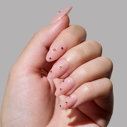 Pink Comet press-on nails on hand - lifestyle photo, 3d sculptural finish