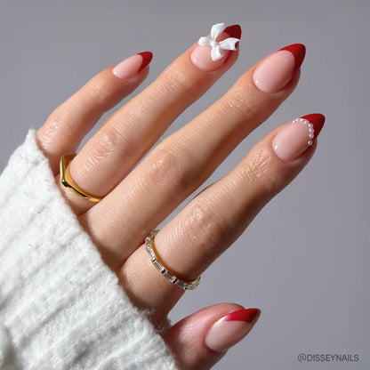 Ruby Ribbons milky cloud dancer press-on nails - almond shape, front view