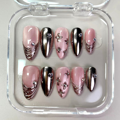 Blush Chrome press-on nails on hand - lifestyle photo, 3d sculptural finish