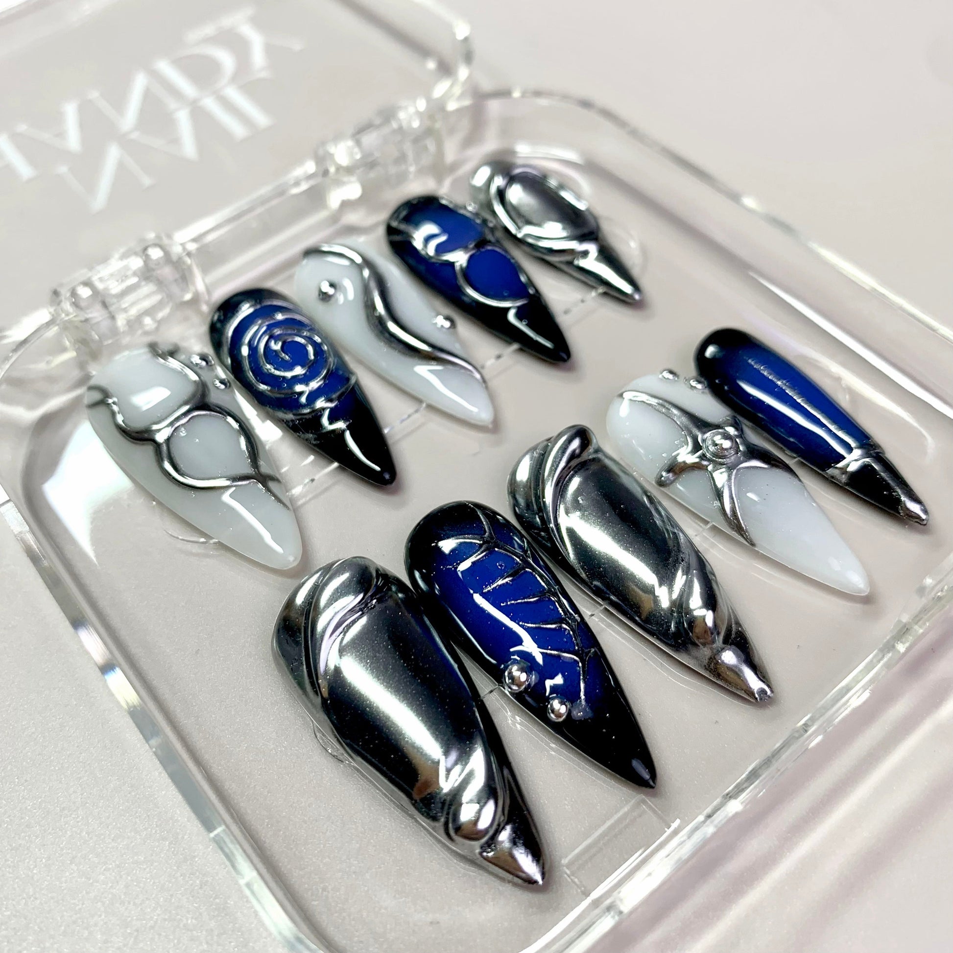 Futuristic Space press-on nails on hand - lifestyle photo, milky cloud dancer finish
