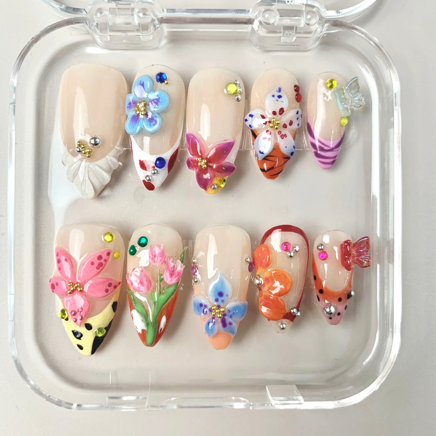 Vivid Bloom press-on nails on hand - lifestyle photo, milky cloud dancer finish