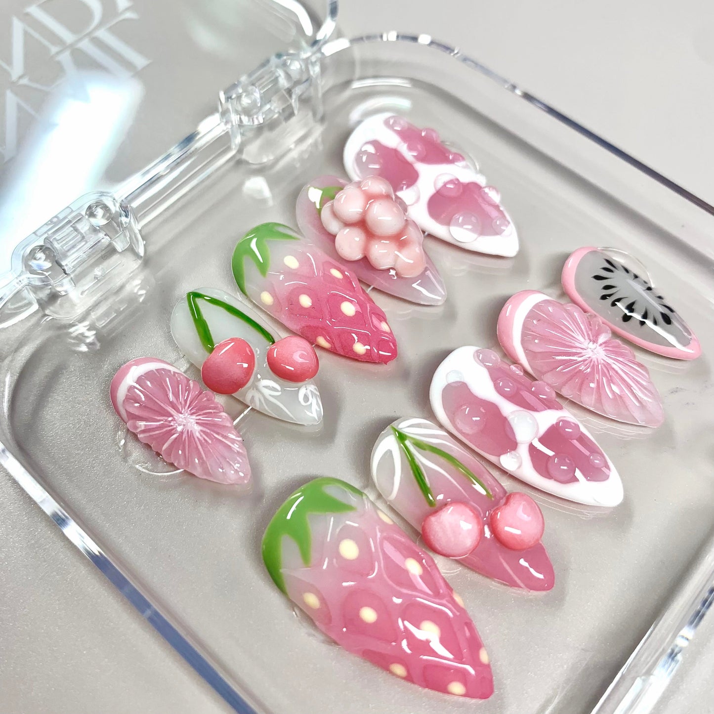 Sweet Garden press-on nails on hand - lifestyle photo, floral finish