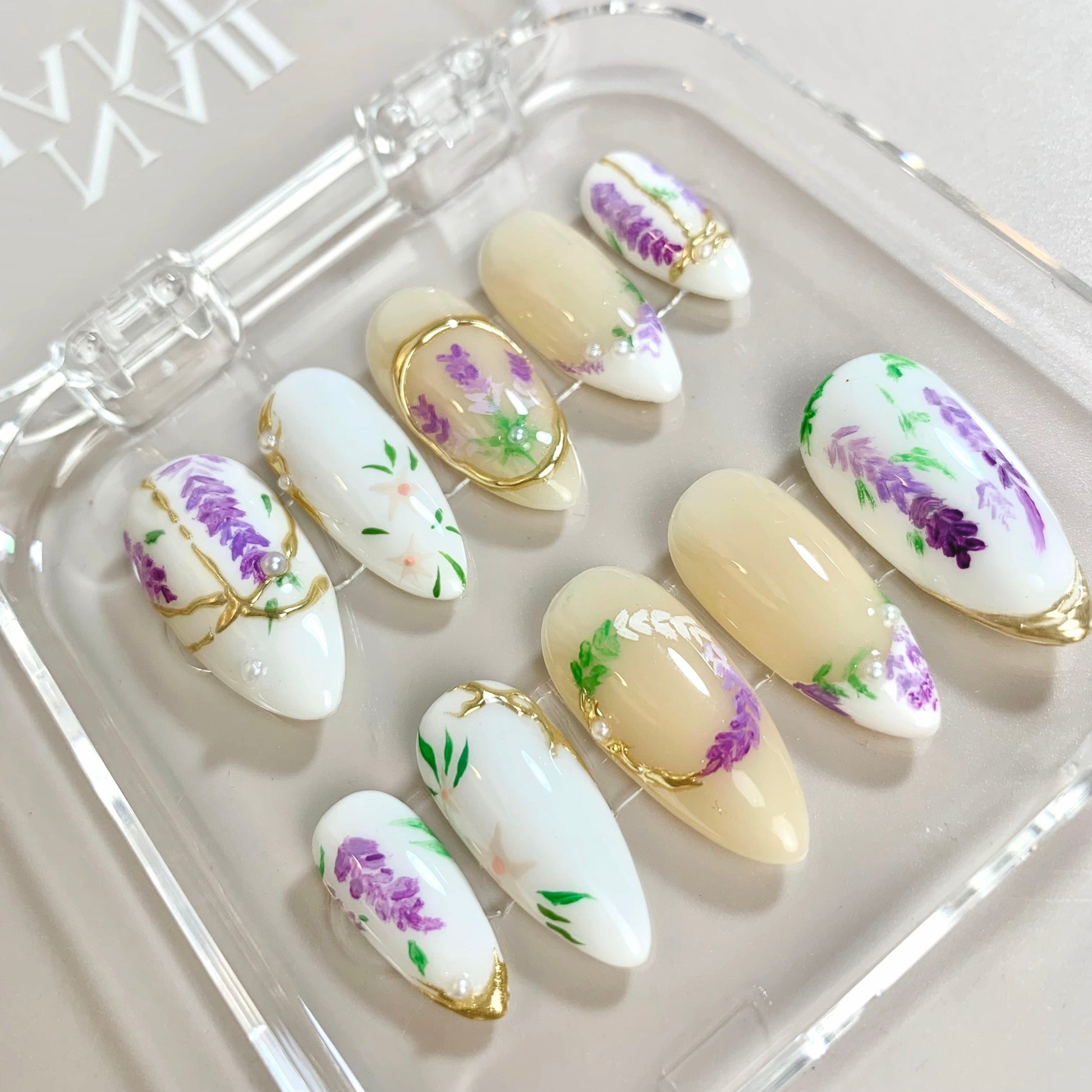 Lavender Blossom press-on nails on hand - lifestyle photo, milky cloud dancer finish