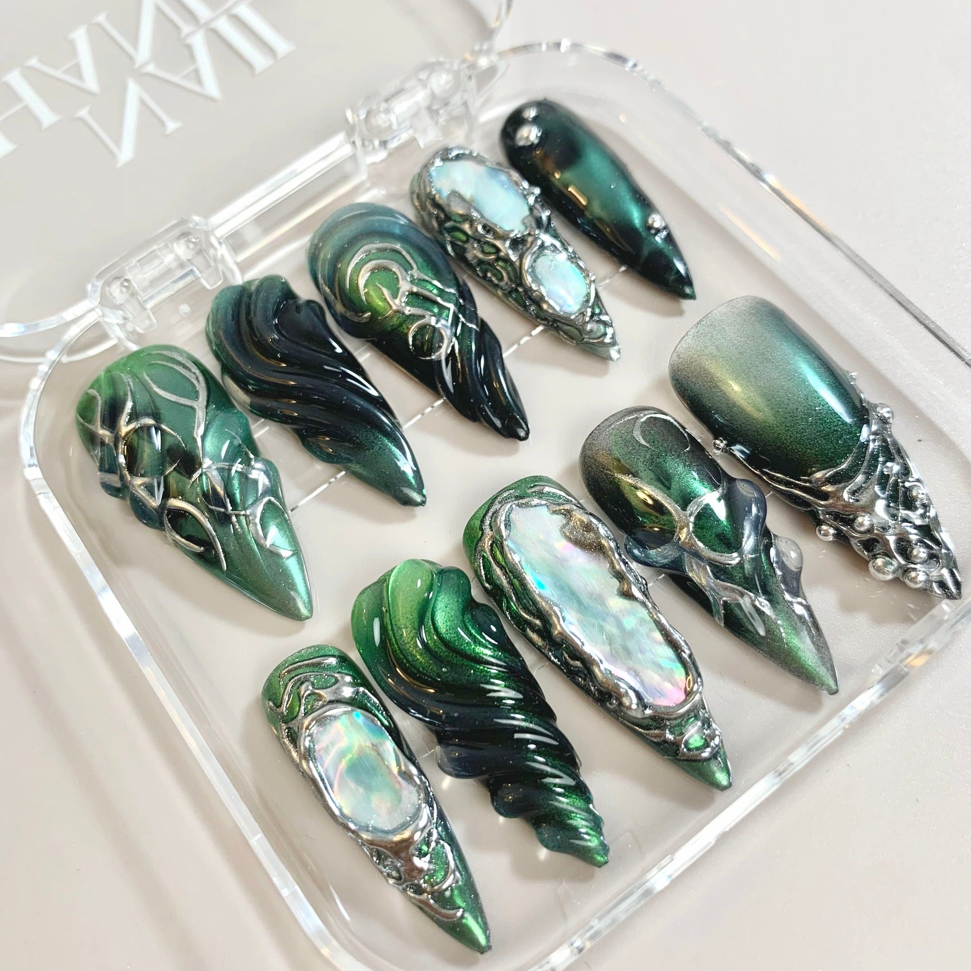 Nocturne Glitch press-on nails on hand - lifestyle photo, pearl-shift finish