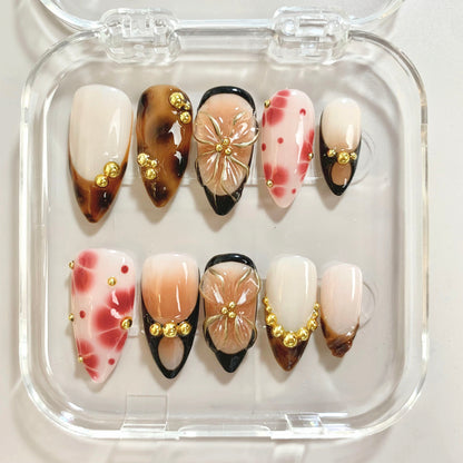 Golden Wild press-on nails on hand - lifestyle photo, french tip finish