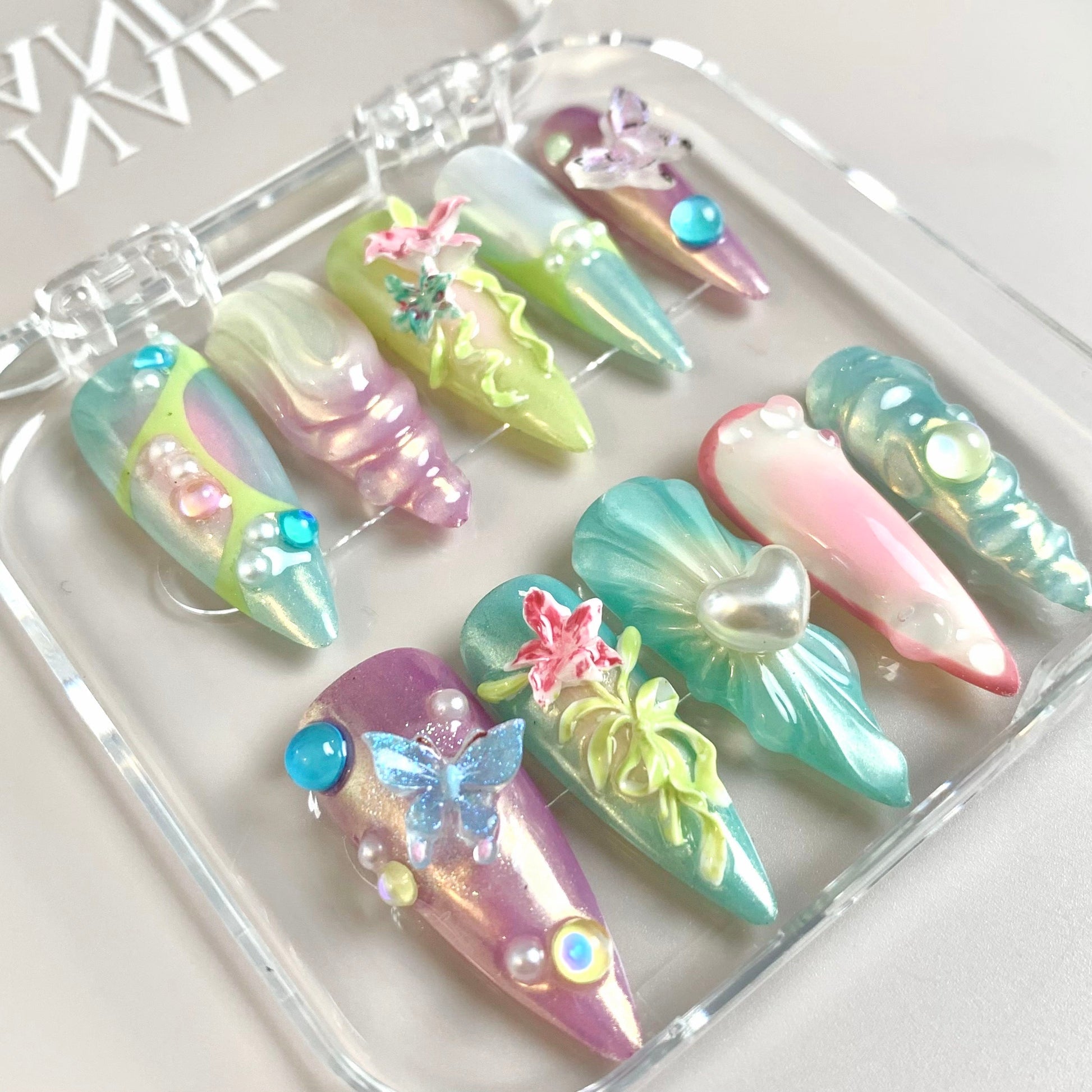 Floral Charm press-on nails on hand - lifestyle photo, 3d sculptural finish