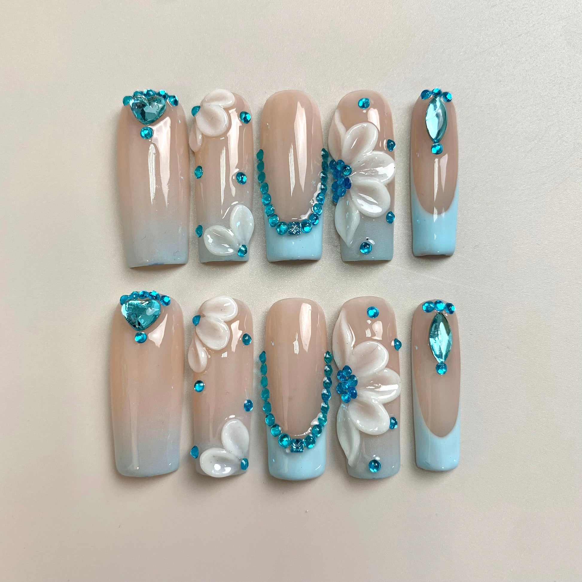 Frosted Flower press-on nails close-up texture detail - milky cloud dancer finish, US shipping