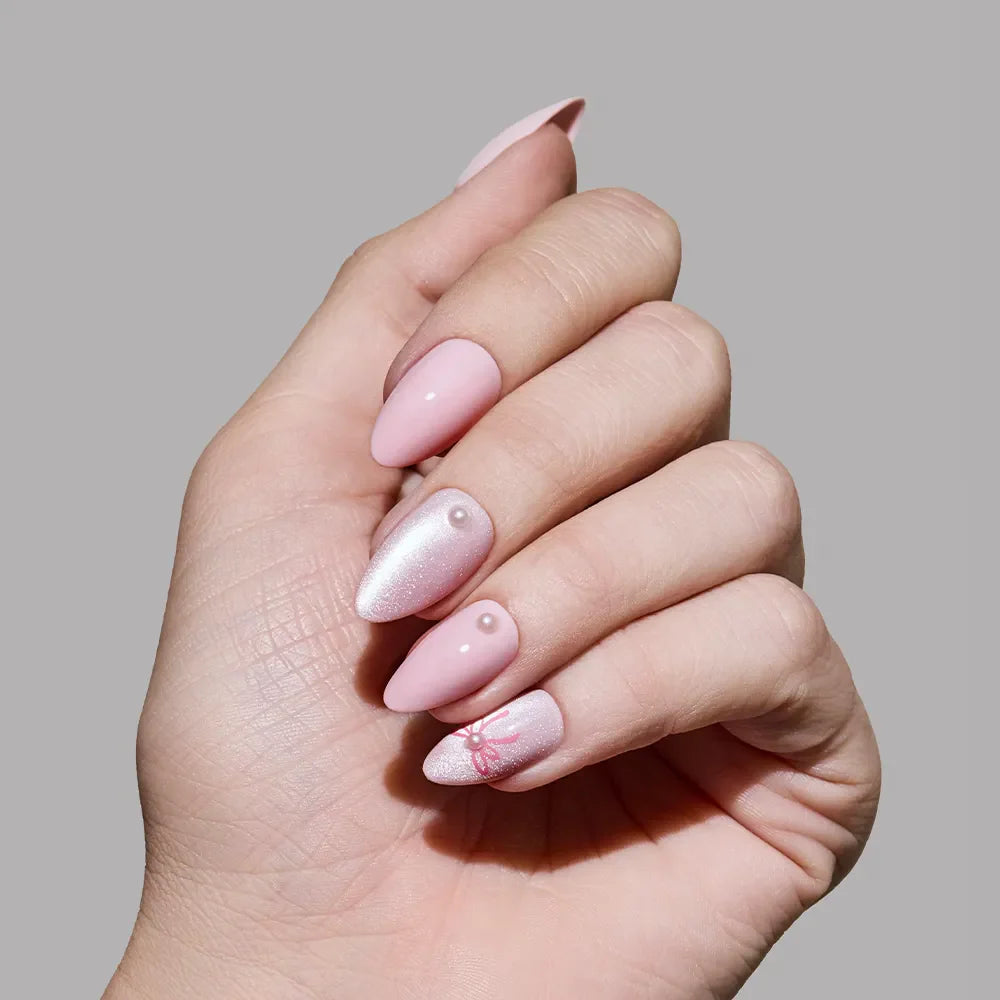 Love Knot press-on nails on hand - lifestyle photo, cat-eye velvet finish