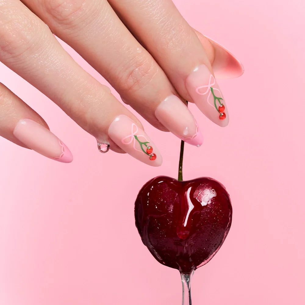 Cherry Bow press-on nails close-up texture detail - french tip finish, US shipping