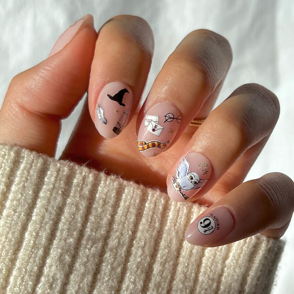 Hogwarts™ soft neutral press-on nails - oval shape, front view
