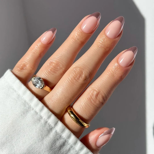 Rock Candy french tip press-on nails - almond shape, front view