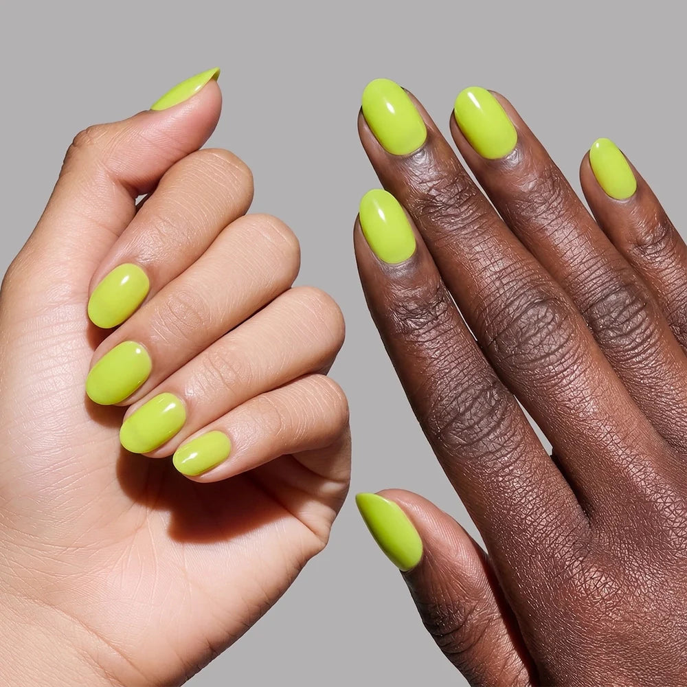 Lime Green press-on nails on hand - lifestyle photo, summer finish