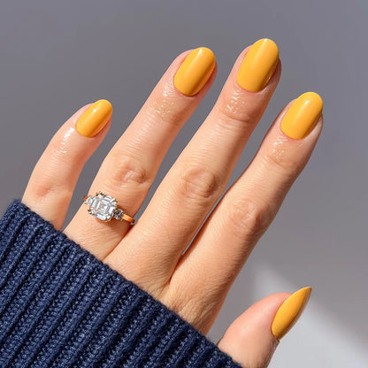 Sunset Orange jelly glaze press-on nails - round shape, front view