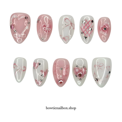 ANGELIC RIBBONS milky cloud dancer press-on nails - almond shape, front view