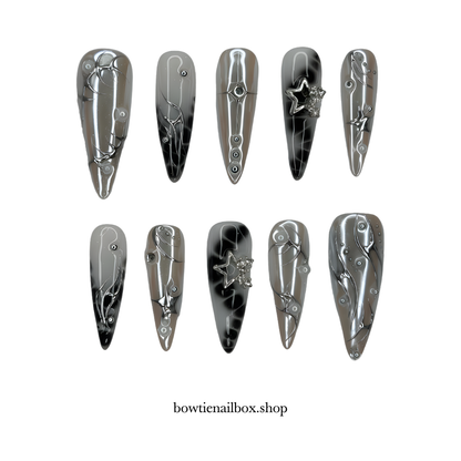 ASTRO STARLET pearl-shift press-on nails - almond shape, front view