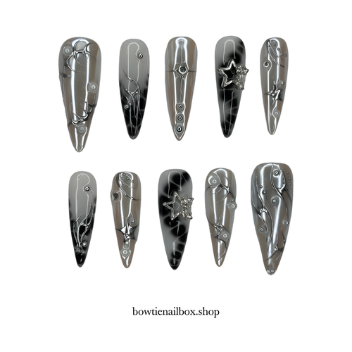 ASTRO STARLET pearl-shift press-on nails - almond shape, front view