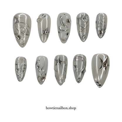 SILVER SURGE pearl-shift press-on nails - almond shape, front view