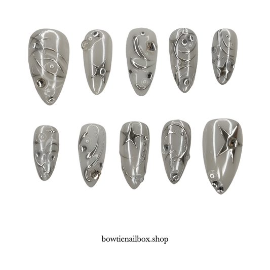 SILVER SURGE pearl-shift press-on nails - almond shape, front view