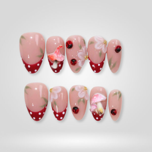 Ladybug Garden floral press-on nails - almond shape, front view