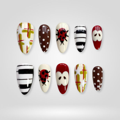 Playful Mix butter yellow press-on nails - almond shape, front view