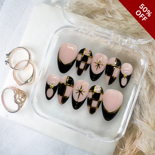 Modern Muse polka dot press-on nails - almond shape, front view