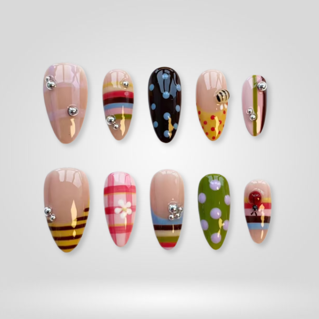 Candy Dots butter yellow press-on nails - almond shape, front view