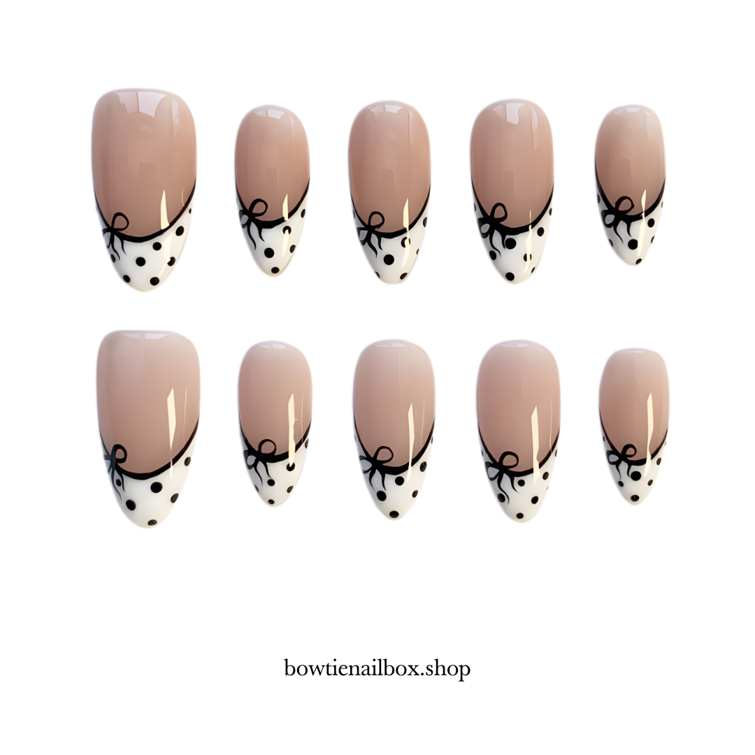 DOTTY CHIC polka dot press-on nails - almond shape, front view